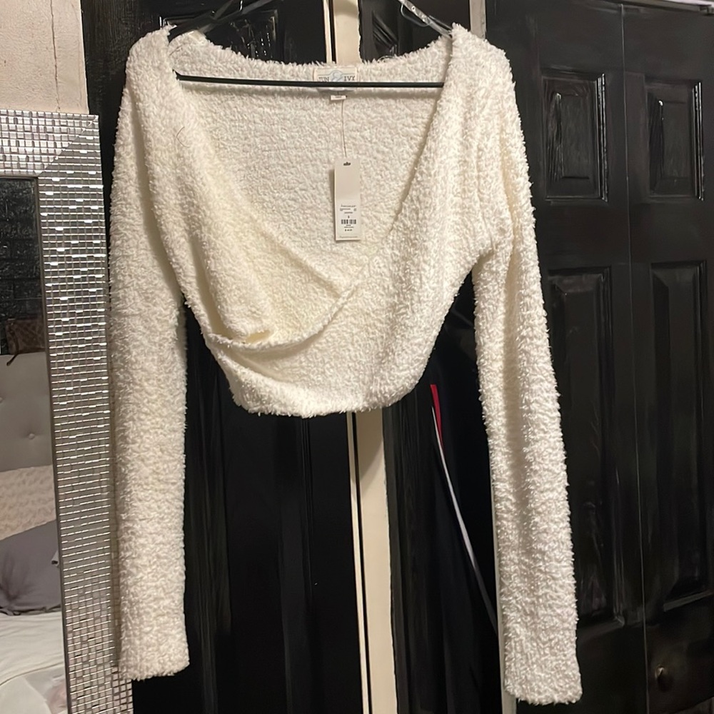 Cream plush crop top cross cross in front